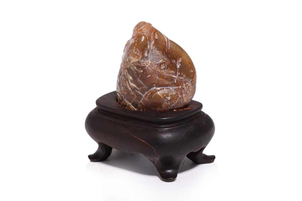 A GROUP OF THREE STONE CARVINGS