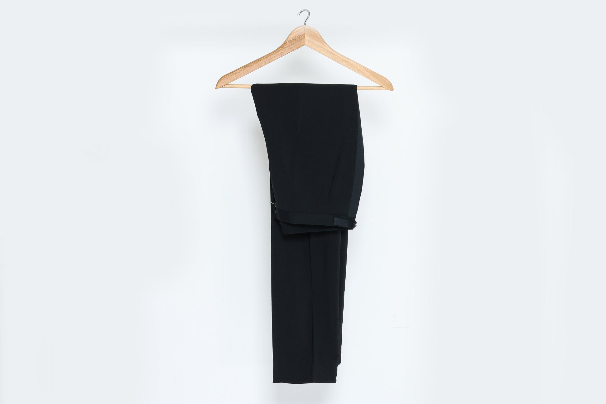 GIANNI VERSACE COUTURE - A PAIR OF BLACK TROUSERS