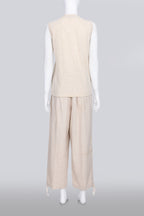 COMME DES GARCONS TRICOT - A 2007 SLEEVELESS TAN GOLD EMBROIDERED SHIRT AND TAN TROUSERS ENSEMBLE