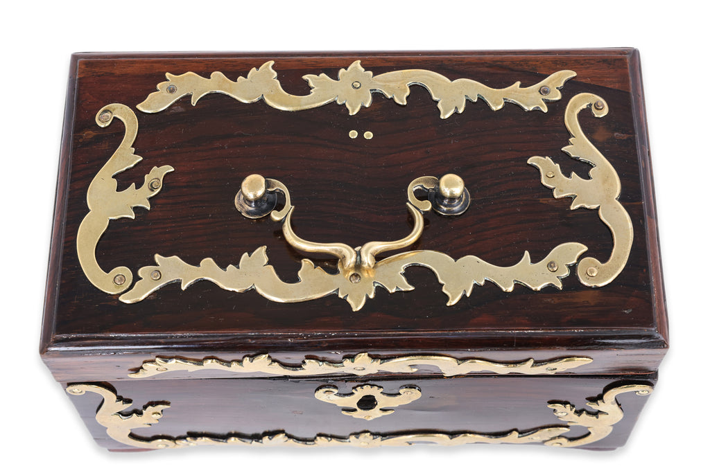 A GEORGE III WALNUT AND BRASS TEA CADDY