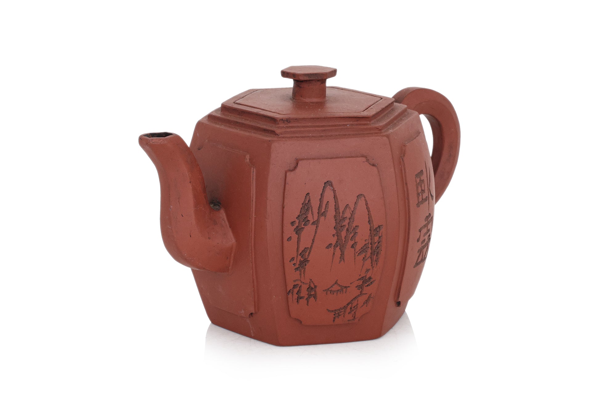 A YIXING POTTERY TEAPOT AND COVER