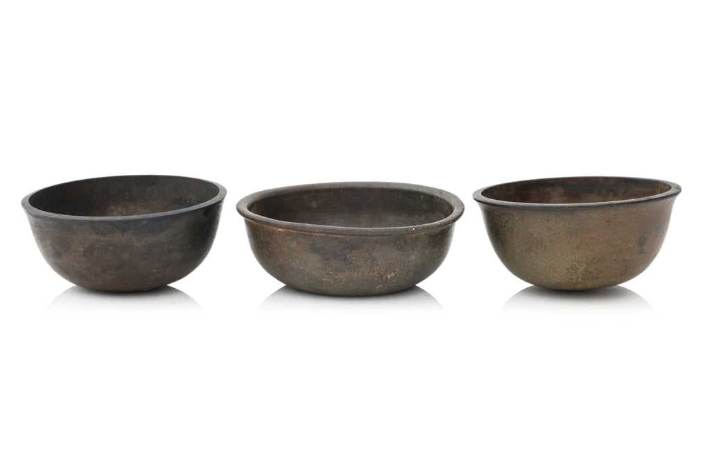 A GROUP OF SIX SOUTH EAST ASIAN BRONZE BOWLS