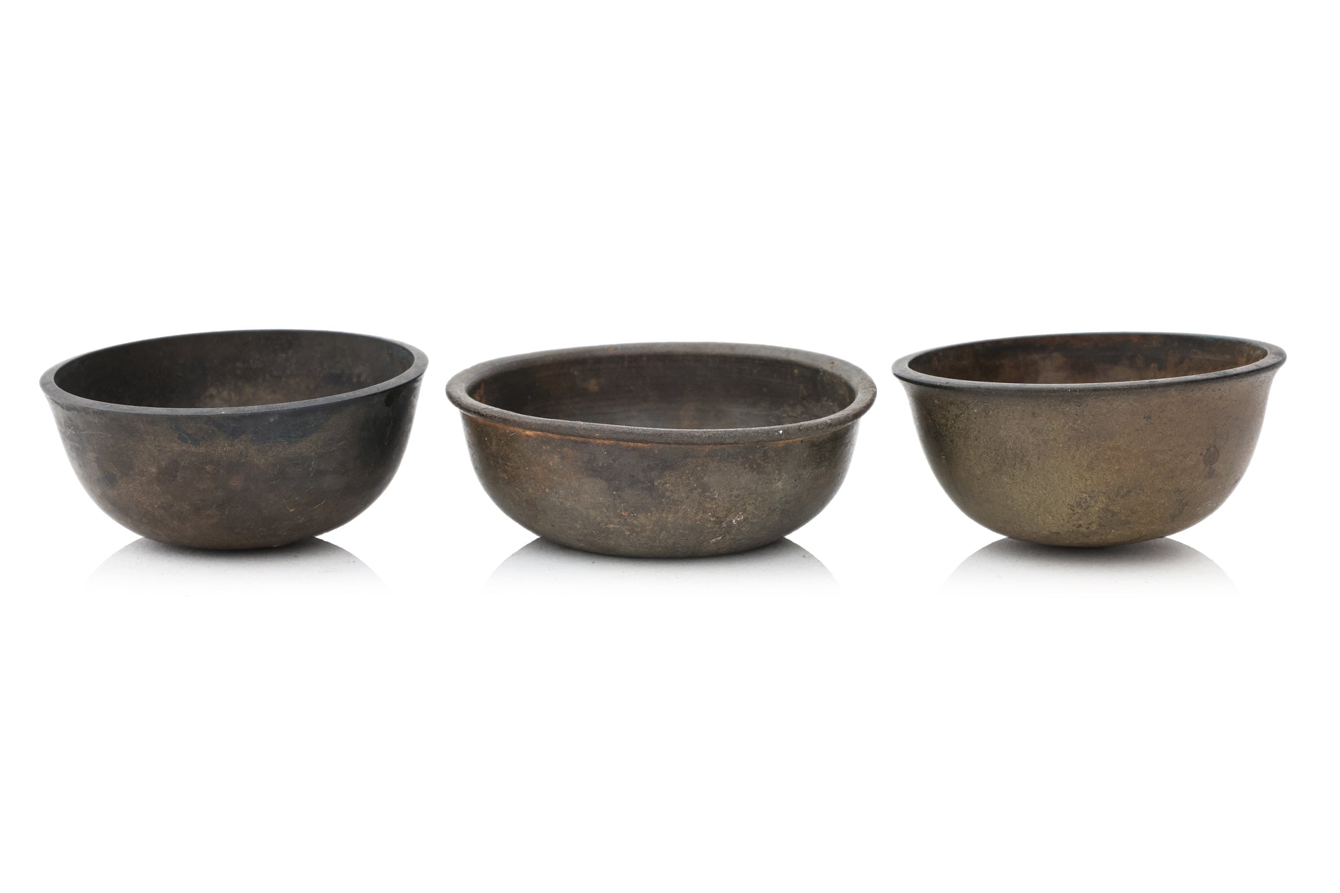 A GROUP OF SIX SOUTH EAST ASIAN BRONZE BOWLS