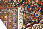 A LARGE MASHAD WOOL CARPET (282 x 198cm)