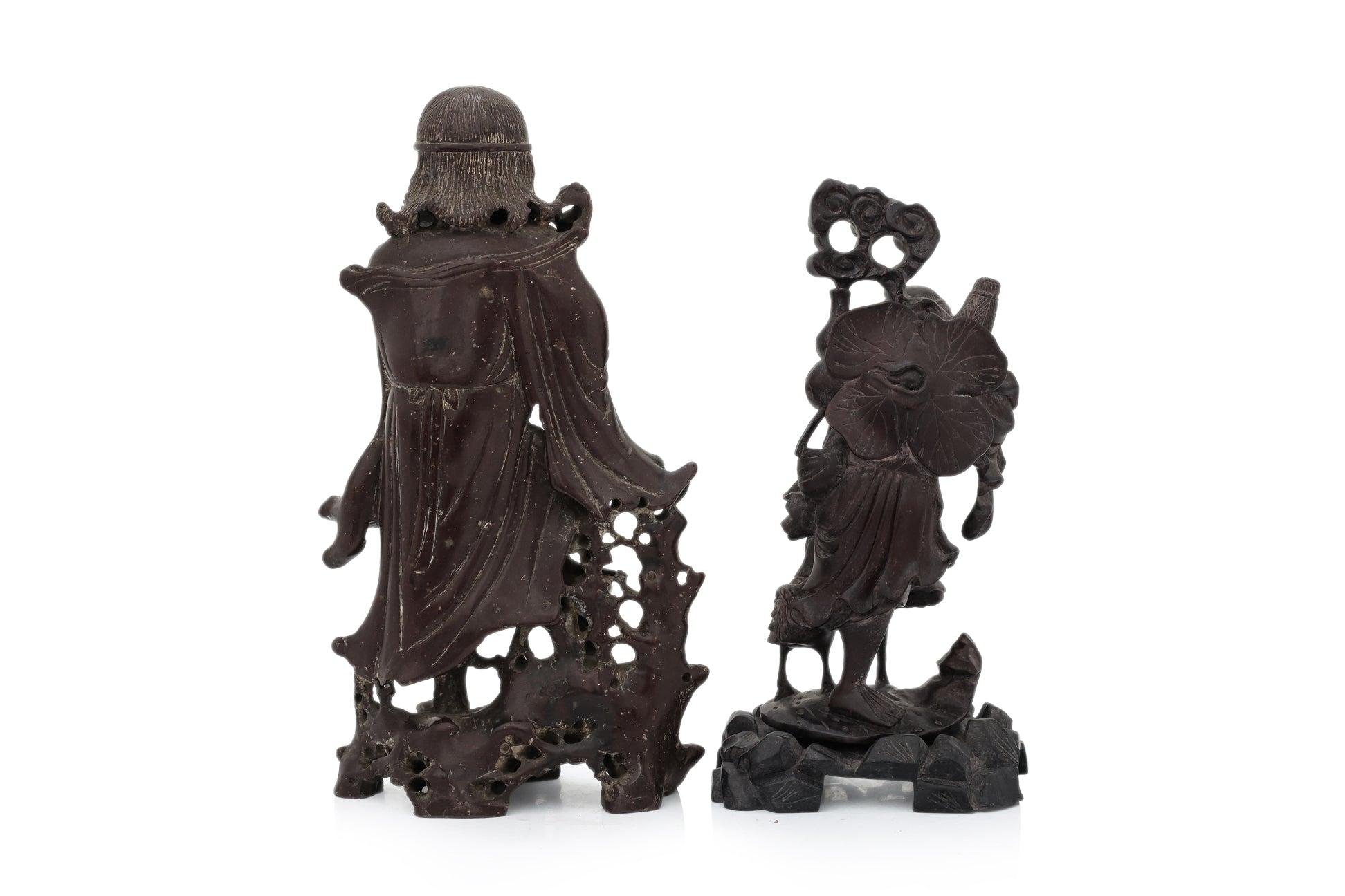 A SOAPSTONE AND A HARDWOOD CARVED FIGURE OF A MONK