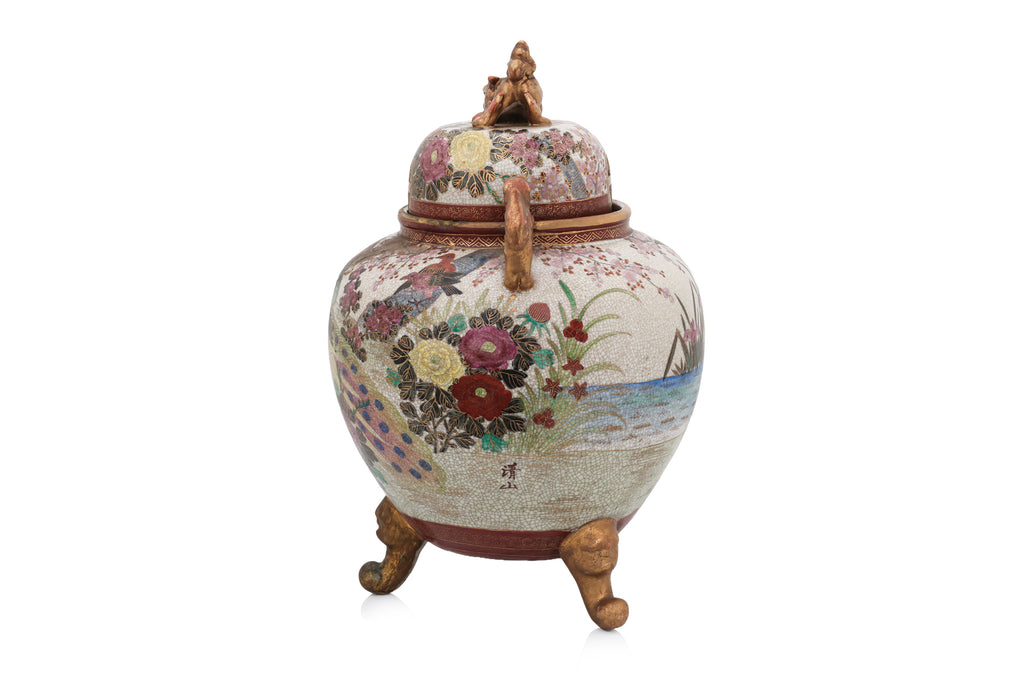 A LARGE SATSUMA POTTERY JAR AND COVER