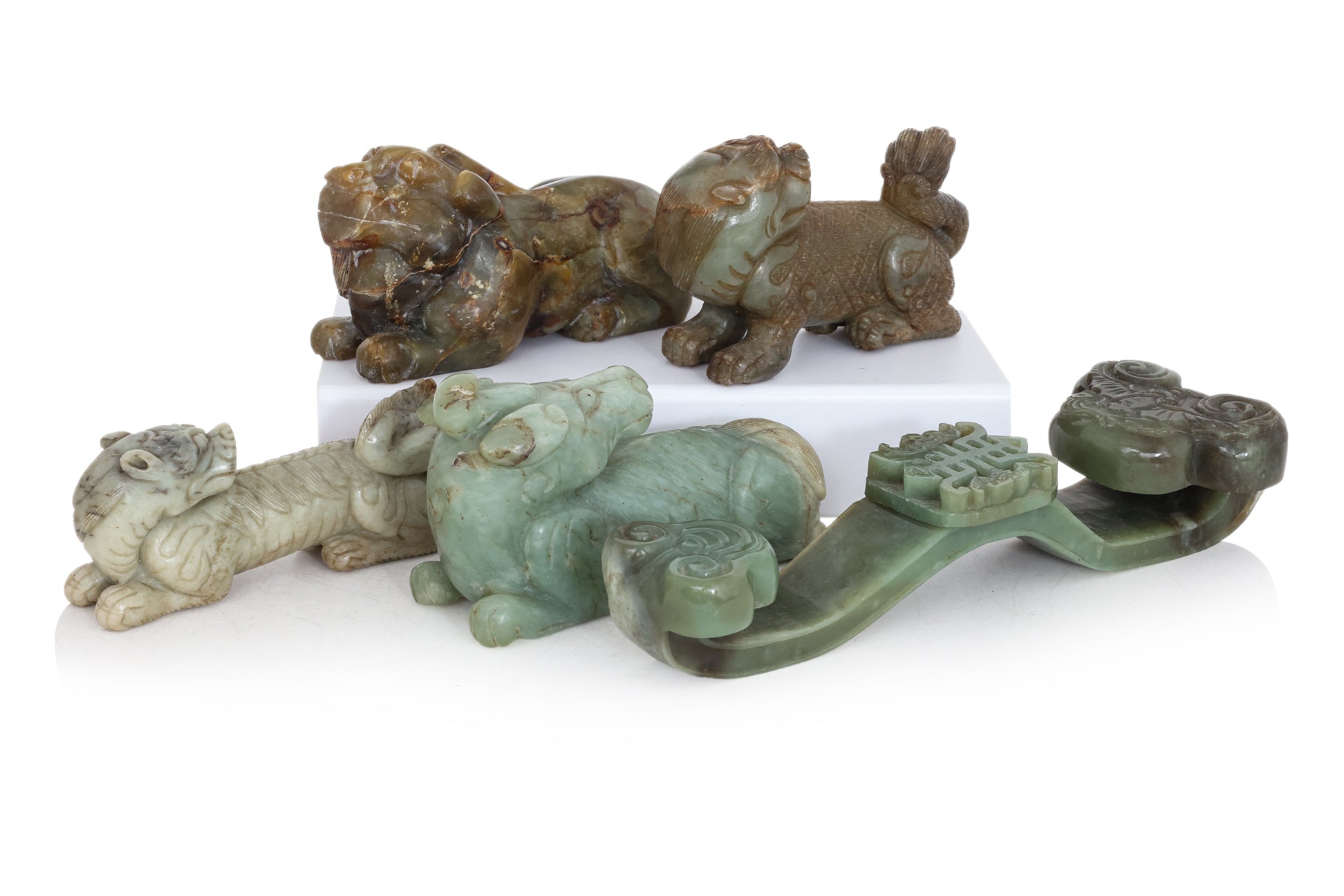 A GROUP OF FIVE JADE CARVINGS