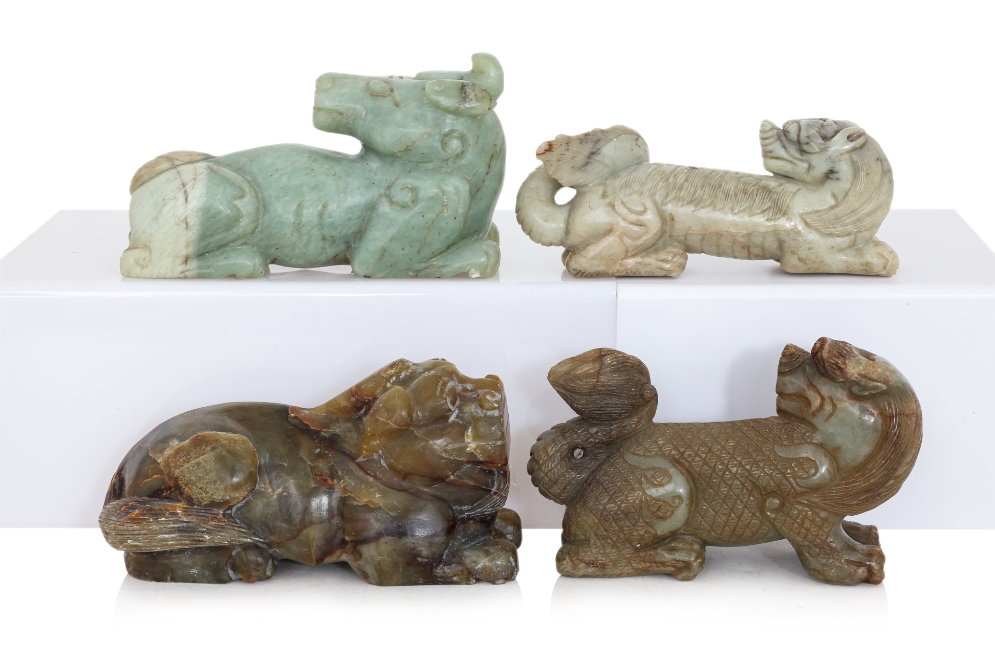 A GROUP OF FIVE JADE CARVINGS