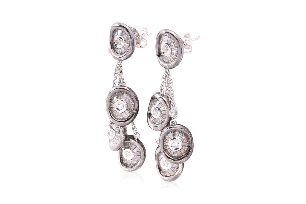A PAIR OF DIAMOND SET DROP EARRINGS