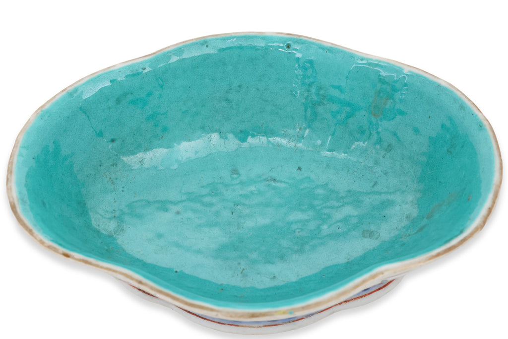 A FAMILLE ROSE 'DRAGON' JOSS STICK HOLDER AND A 'SAN DUO' FOOTED DISH