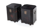 A PAIR OF BLACK LACQUERED OCTAGONAL WOODEN CHESTS