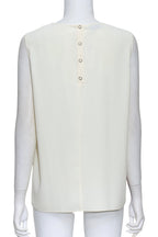 MOSCHINO - A SLEEVELESS POPPY PRINT COLLARED TOP