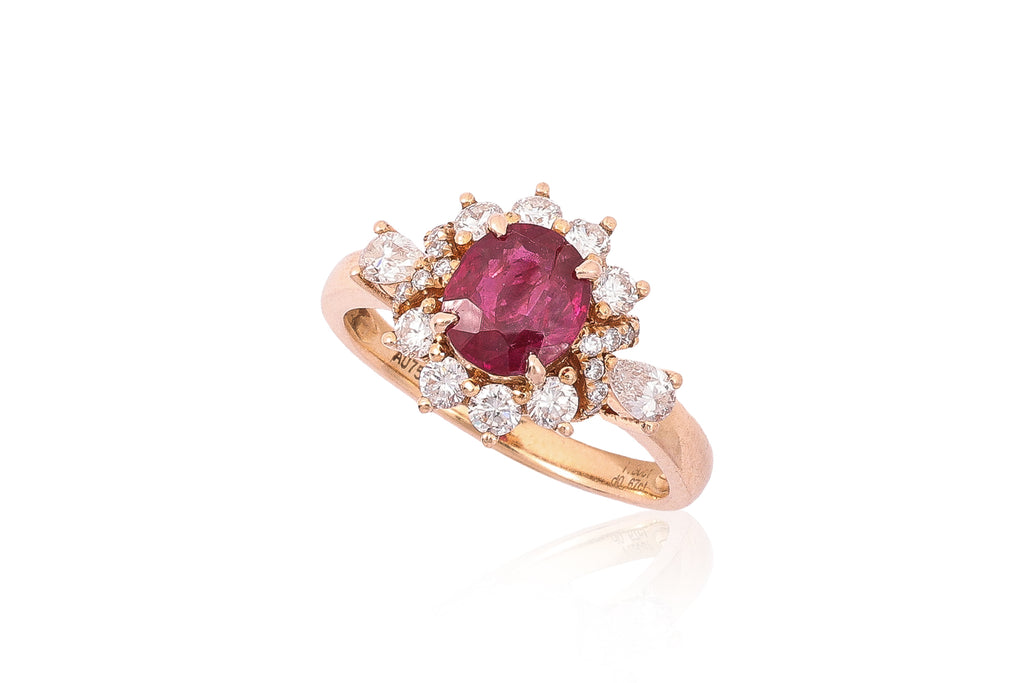 AN UNHEATED VIVID RED BURMESE RUBY AND DIAMOND RING