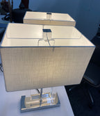 A PAIR OF CONTEMPORARY ACRYLIC AND CHROME PLATED TABLE LAMPS