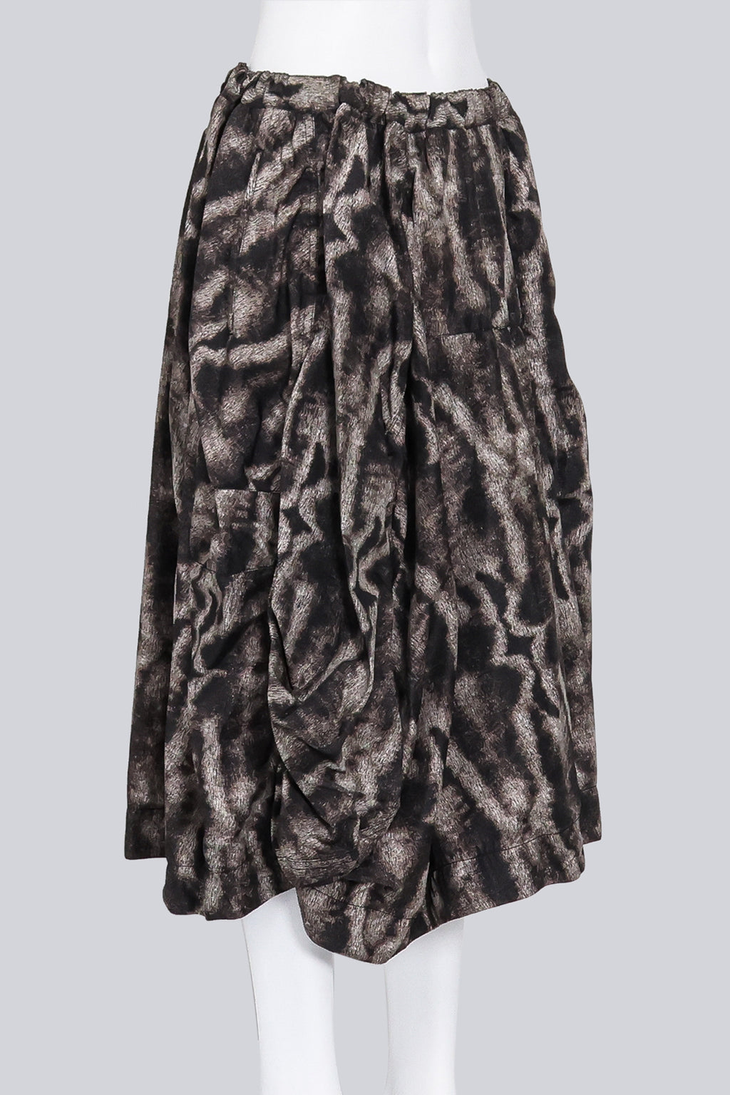 COMME DES GARCONS - A 2015 MUTED BROWN AND BEIGE FUR PRINT SKIRT