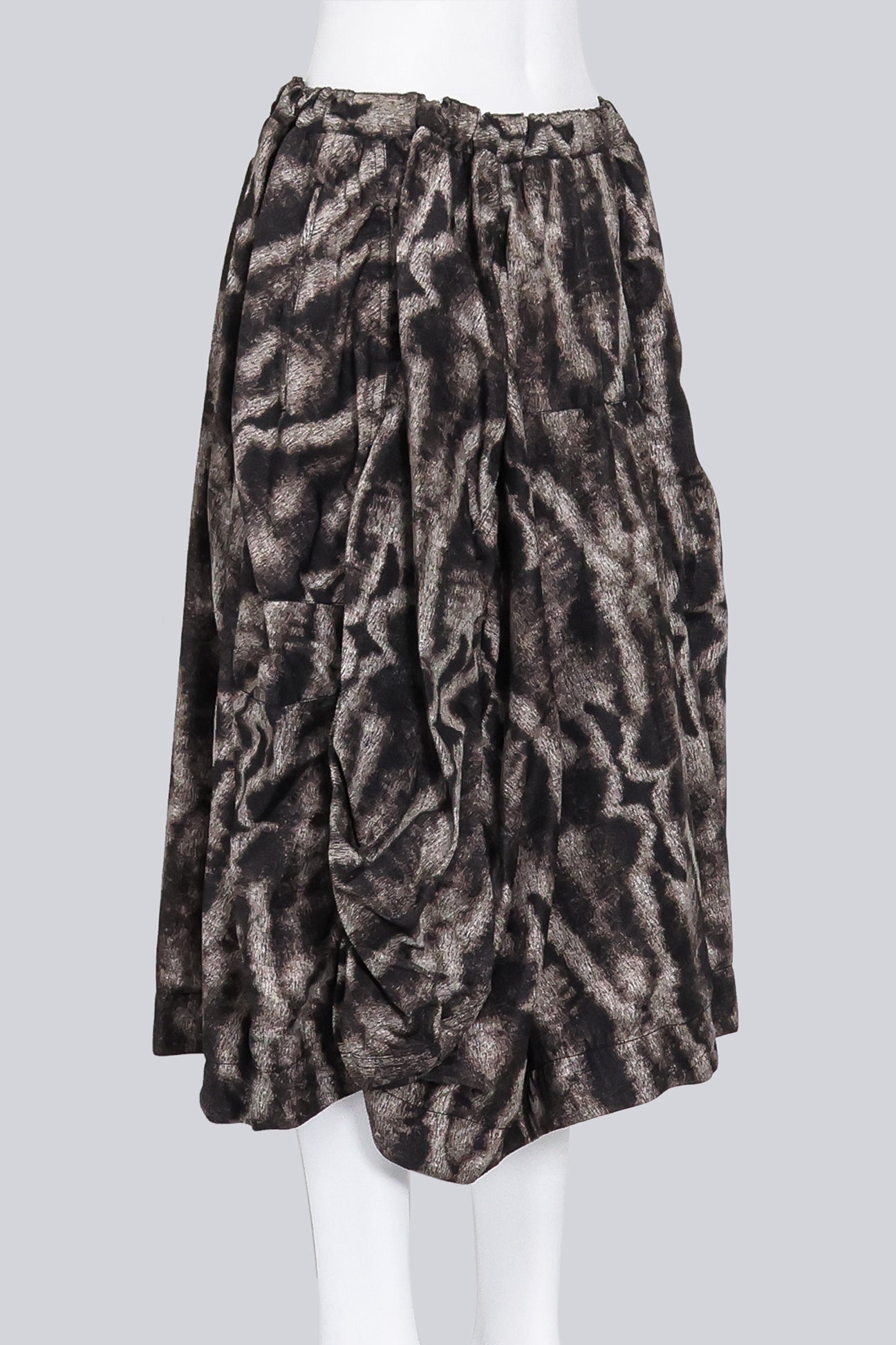 COMME DES GARCONS - A 2015 MUTED BROWN AND BEIGE FUR PRINT SKIRT