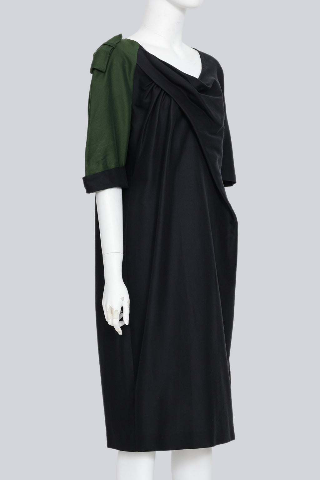 DRIES VAN NOTEN - A BLACK DRESS WITH SINGLE GREEN SLEEVE