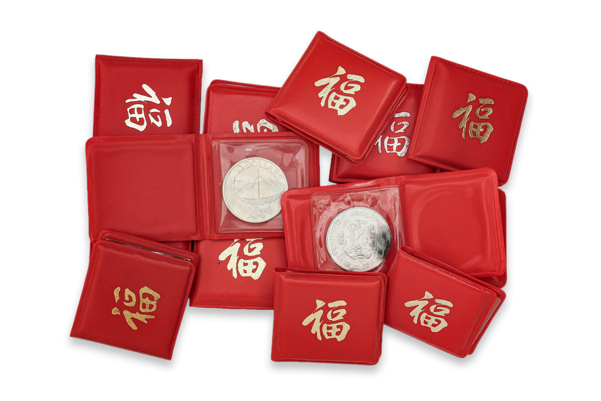 A GROUP OF SINGAPORE COMMEMORATIVE SILVER COINS (13)