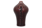 A FLAMBE VASE WITH ELEPHANT LUGS