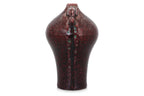 A FLAMBE VASE WITH ELEPHANT LUGS