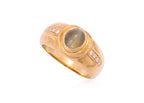 A CAT'S EYE CHRYSOBERYL AND DIAMOND RING