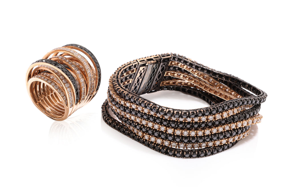 A MULTI-ROW DIAMOND AND BLACK DIAMOND BRACELET WITH MATCHING RING
