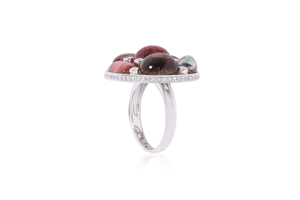 A TOURMALINE AND DIAMOND CLUSTER RING