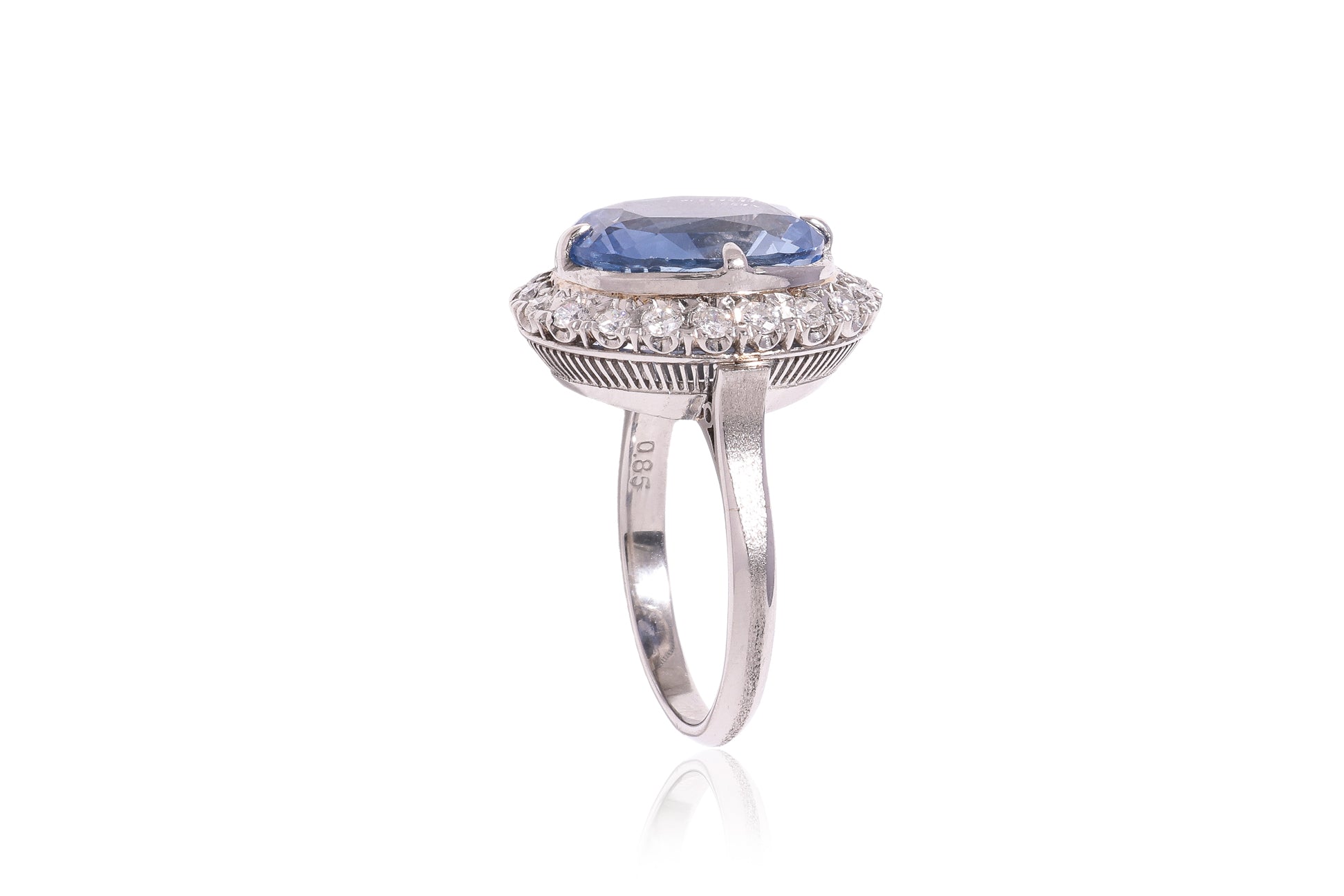 A UNHEATED SAPPHIRE AND DIAMOND 'HALO' RING