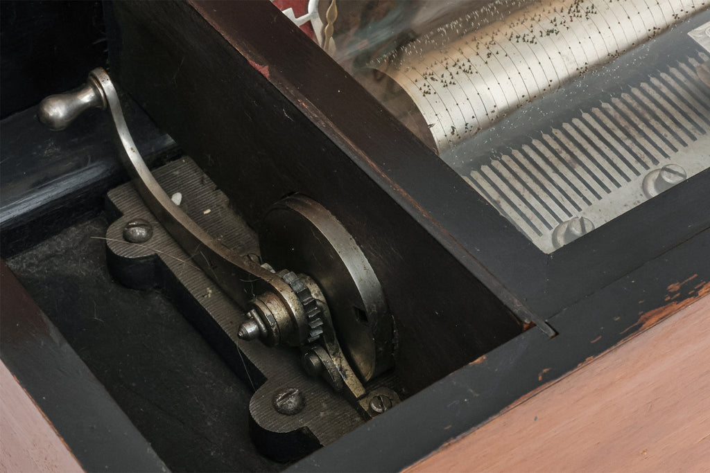 A SWISS CYLINDER MUSIC BOX