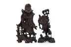 A SOAPSTONE AND A HARDWOOD CARVED FIGURE OF A MONK
