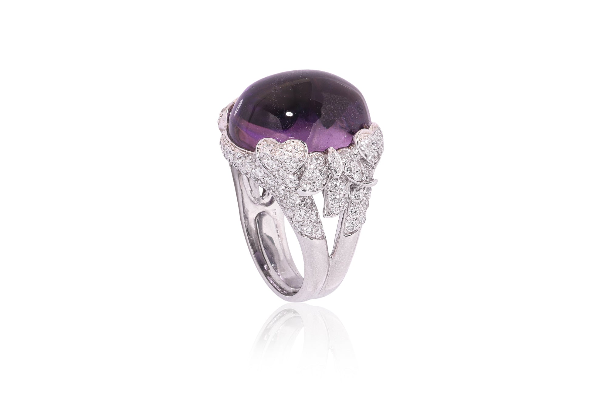 AN AMETHYST AND DIAMOND COCKTAIL RING