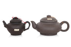 A GROUP OF THREE YIXING POTTERY TEAPOTS