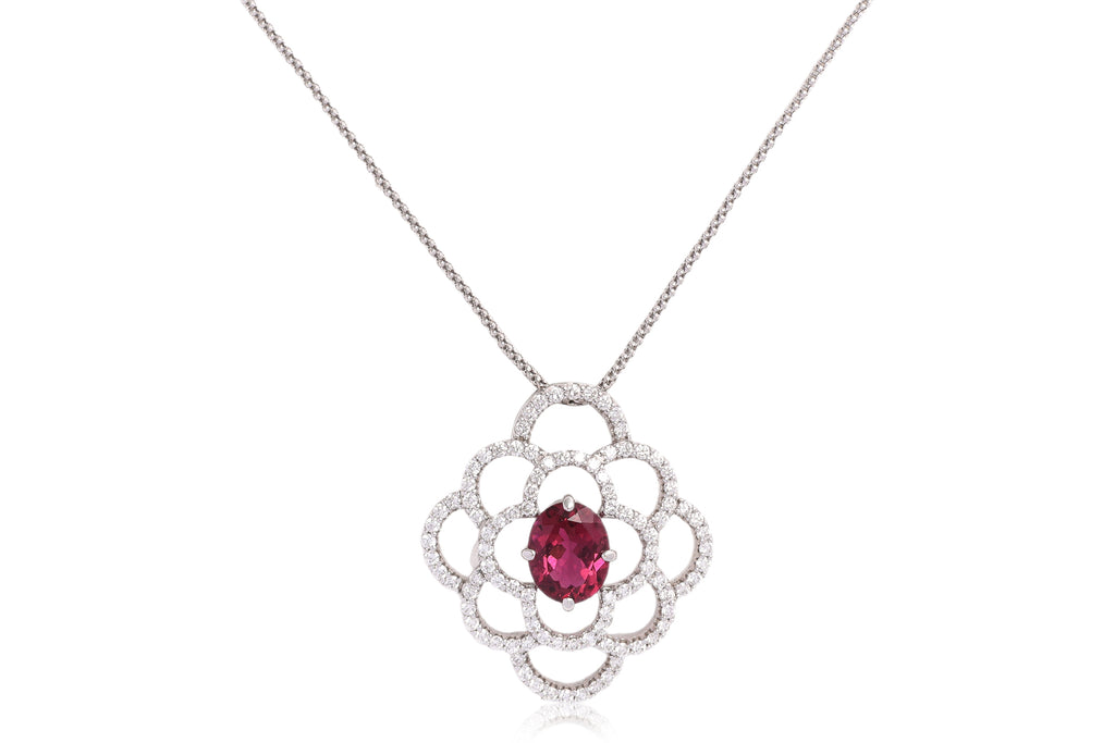 A TOURMALINE AND DIAMOND PENDANT BY JEUNET, WITH A CHAIN