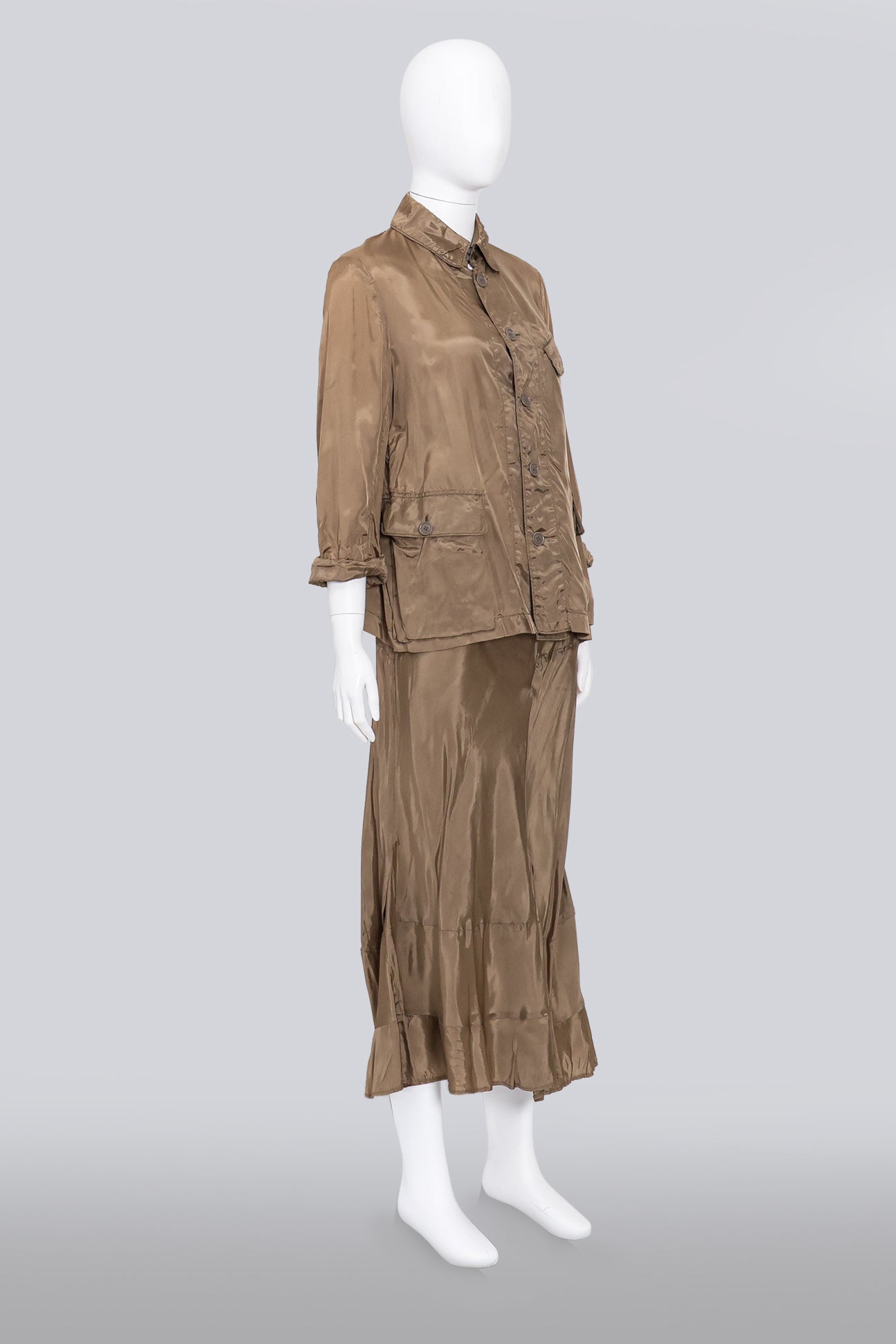 COMME DES GARCONS - AN AGED BRONZE UTILITY BLOUSE AND MATCHING SKIRT SET