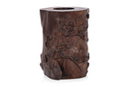A CARVED HARDWOOD BRUSH POT