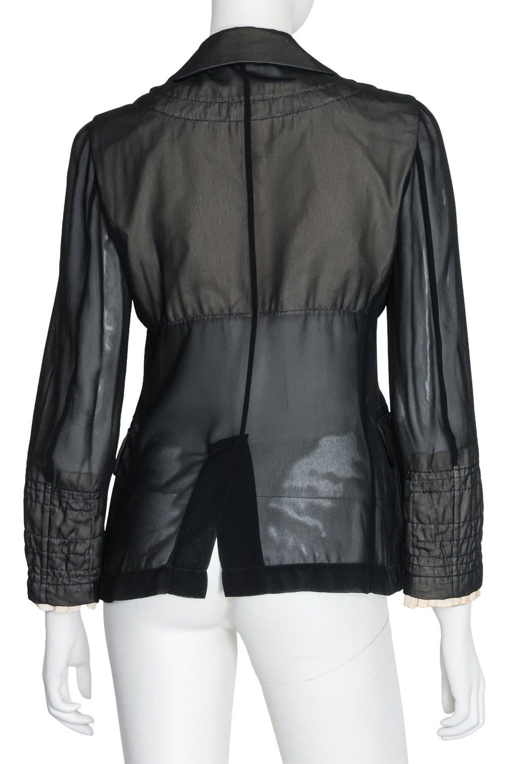 COMME DES GARÇONS - A SHEER PADDED COAT