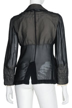 COMME DES GARÇONS - A SHEER PADDED COAT