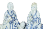 TWO BLUE AND WHITE PORCELAIN FIGURES