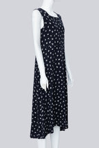 COMME DES GARCONS - A NAVY DRESS WITH A WHITE FLORAL PATTERN