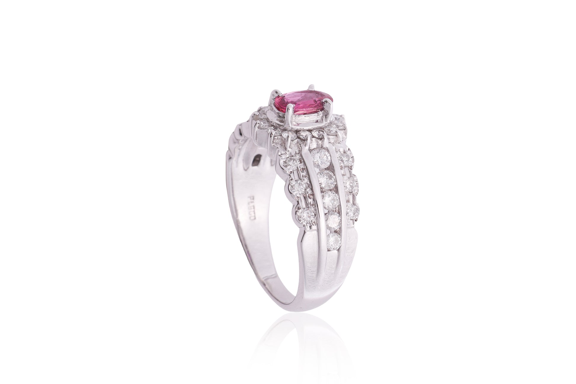 A RUBY AND DIAMOND CLUSTER RING