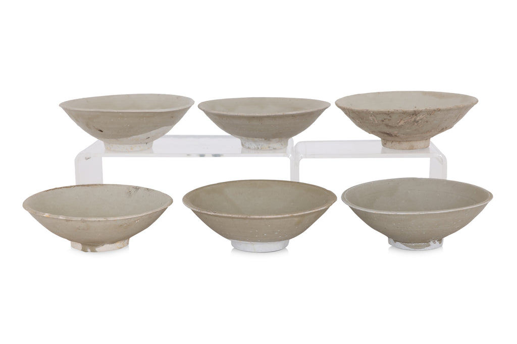 A GROUP OF SIX OLIVE-GREEN GLAZED BOWLS