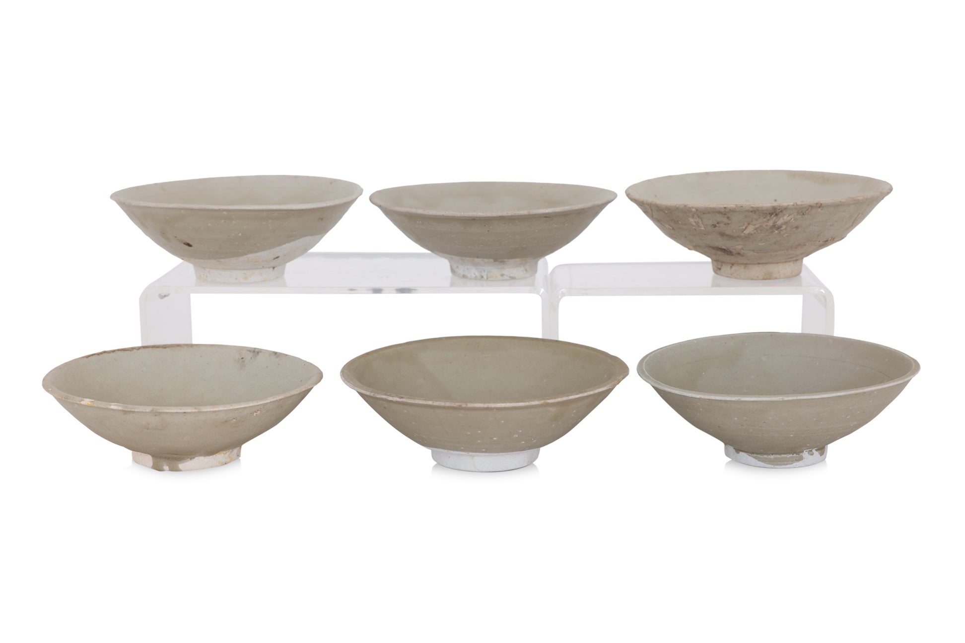 A GROUP OF SIX OLIVE-GREEN GLAZED BOWLS
