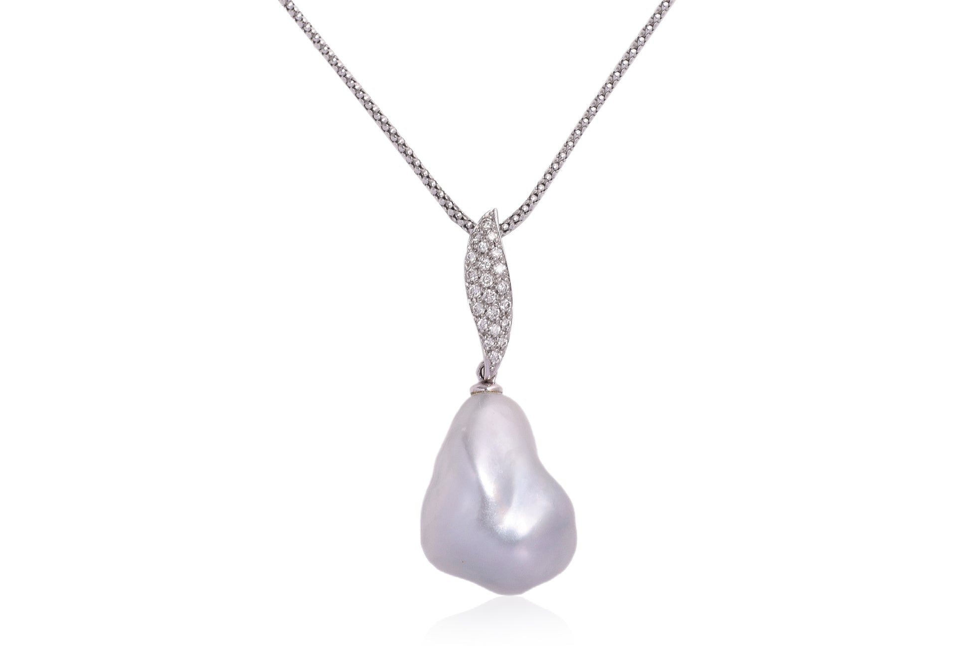 A LARGE BAROQUE SOUTH SEA PEARL AND DIAMOND PENDANT ON CHAIN
