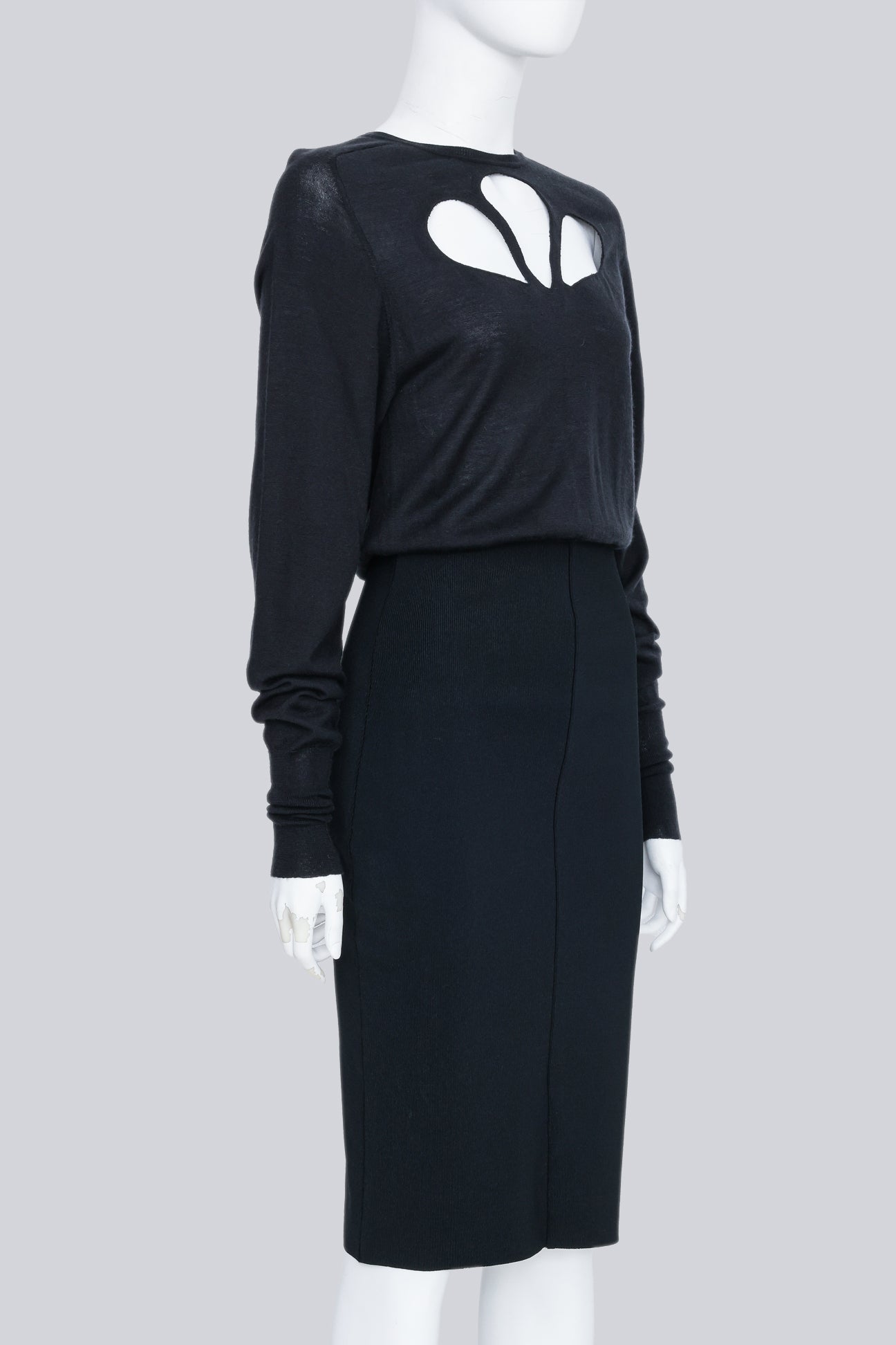 BALENCIAGA - A BLACK 'LE DIX' CUTOUT DRESS FROM F/W 2001 BY NICOLAS GHESQUIÈR