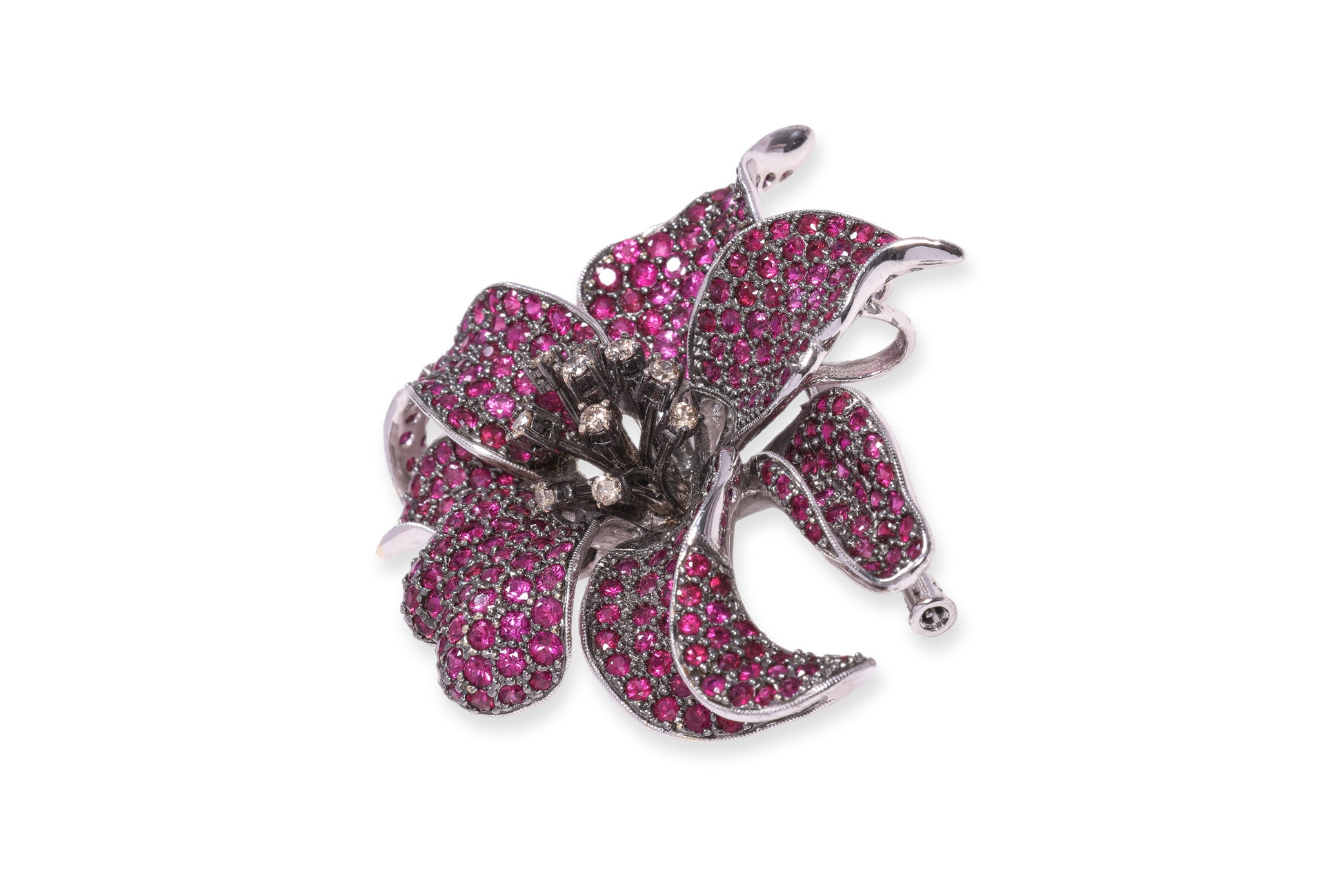 A RUBY AND DIAMOND STYLIZED 'ORCHID' BROOCH