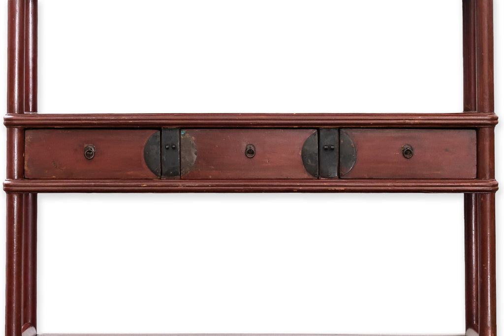 A CHINESE RED LACQUERED DISPLAY CABINET