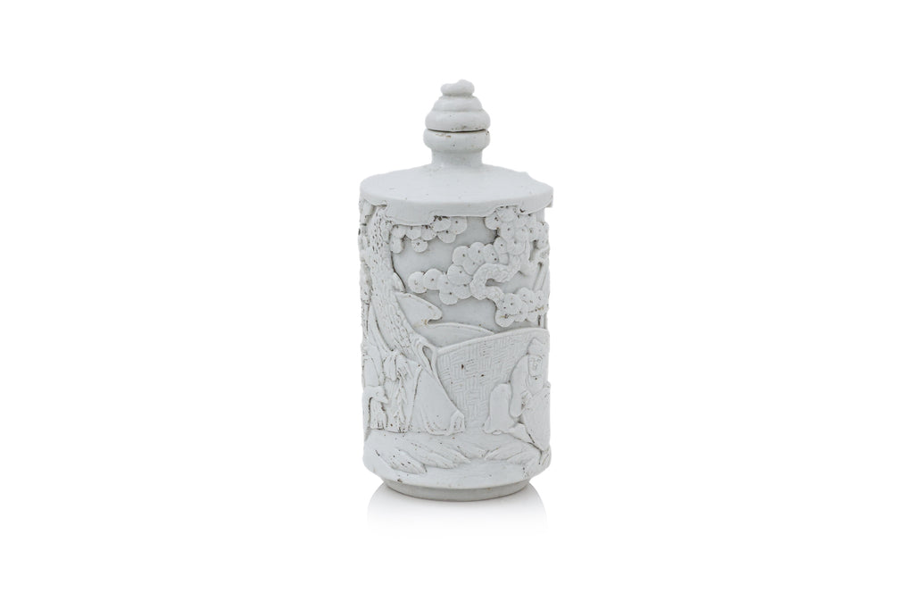 A SMALL WHITE GLAZED PORCELAIN BOTTLE