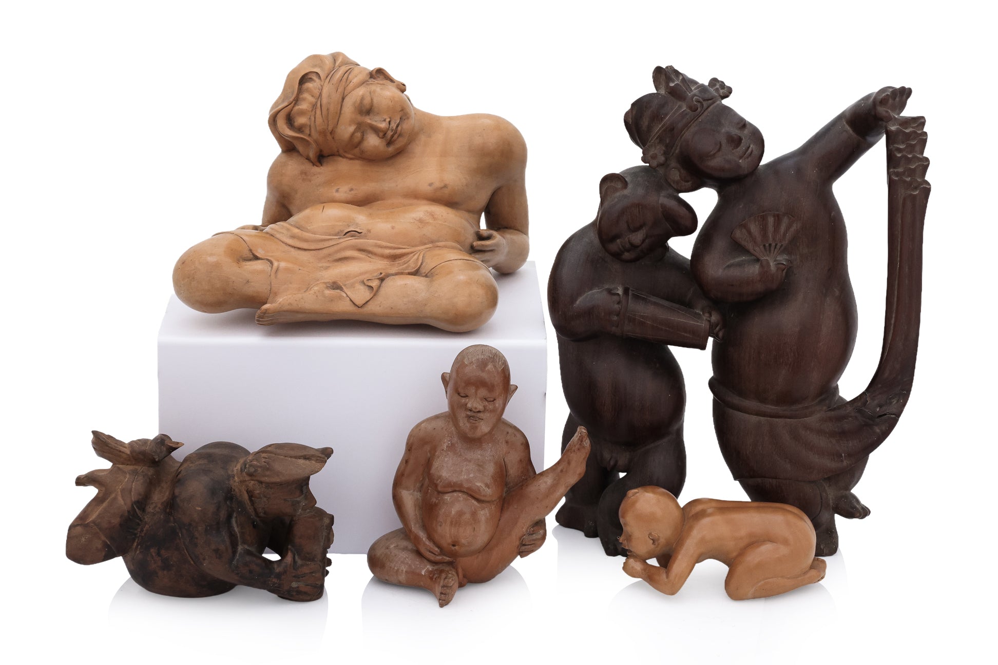 A GROUP OF FIVE BALINESE WOOD CARVINGS