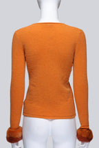 BLUMARINE - AN ORANGE TANK TOP AND CARDIGAN SET