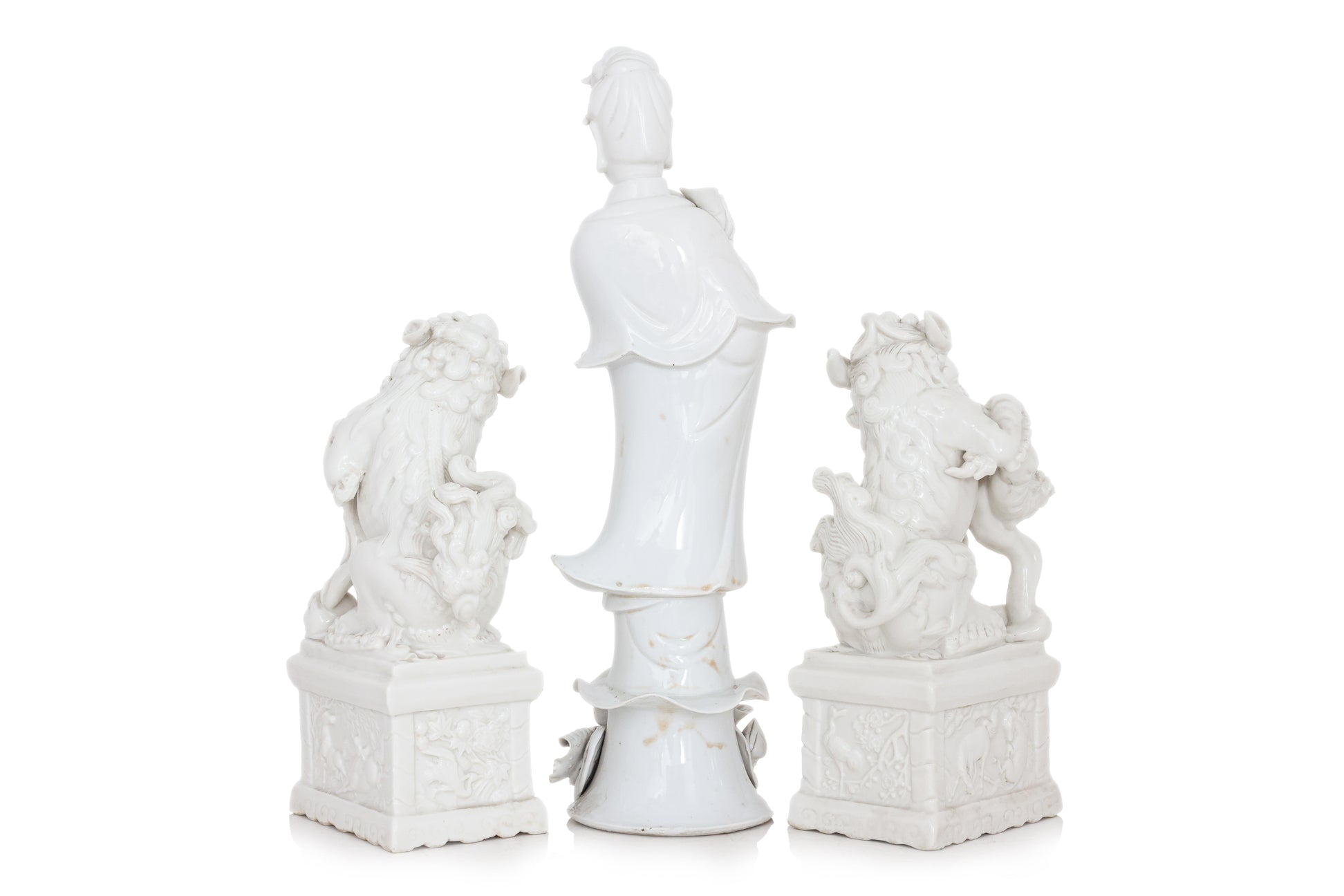 A GROUP OF THREE BLANC DE CHINE PORCELAIN FIGURES